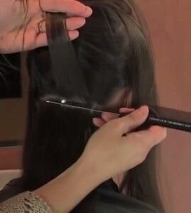 installing-tape-in-hair-extensions
